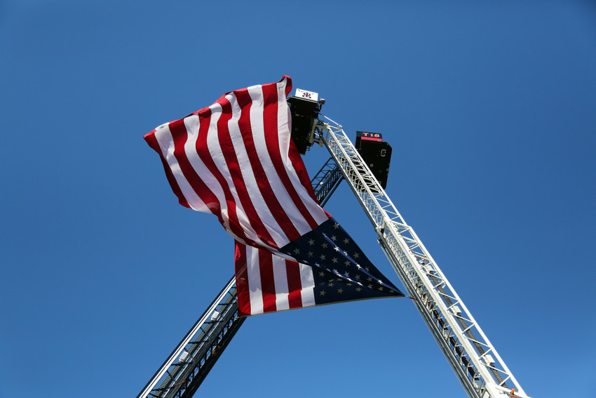 The American Flag flew high above as more than 2,300 first responders and community members gathered to remember the events of Sept. 11, 2001.